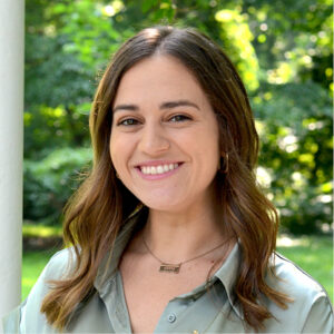 Ella headshot in a green shirt