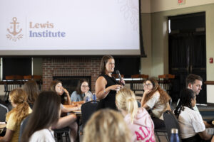 Woman speaking at a Lewis Institute event