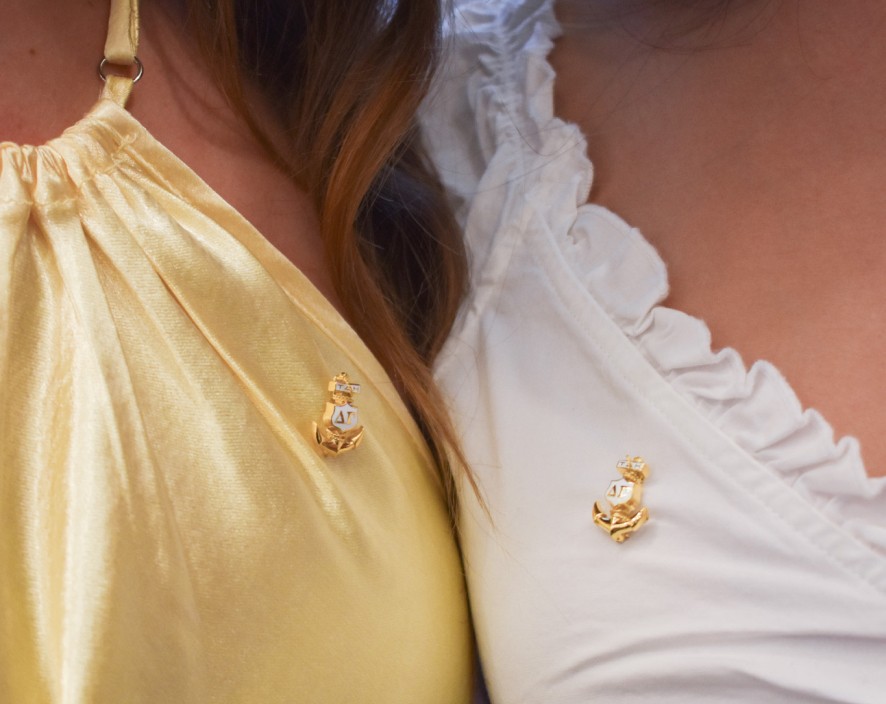 Two DG anchor pin on girls attire