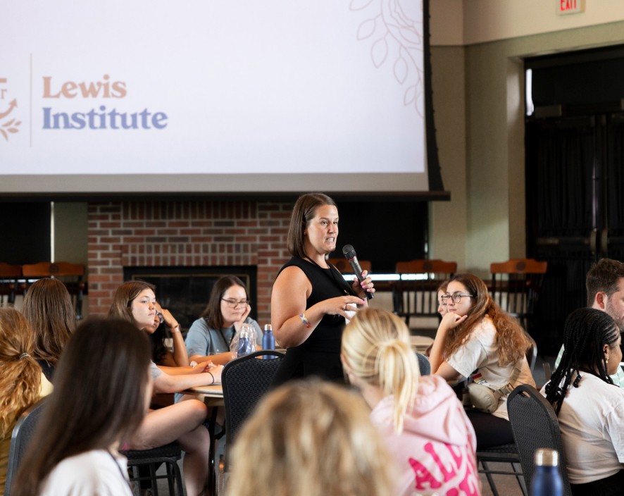 Woman speaking to group at Lewis Institute