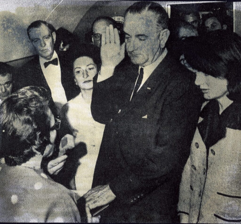 An older image of LBJ being sworn into office