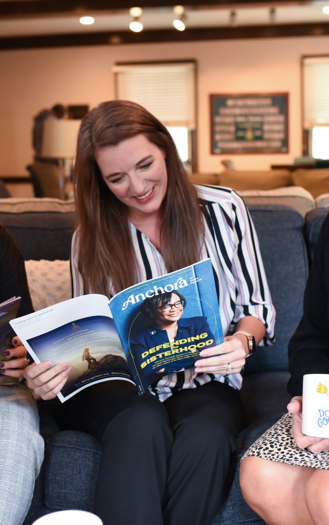 Woman reading magazine