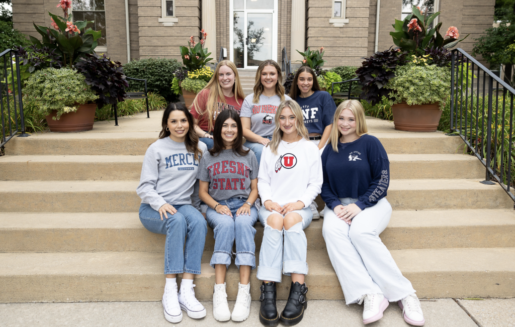 Collegiate Development Consultants pose for a photo